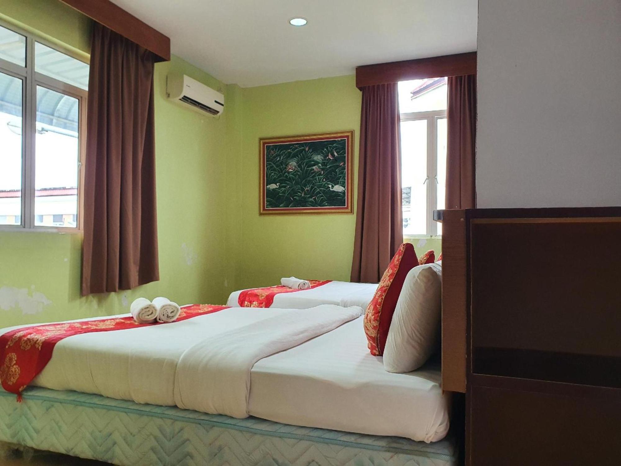 Oyo 90964 Melody 88 Inn Мири Экстерьер фото